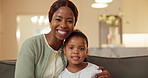 Support, mother or girl on sofa with face, childcare or bonding together in loving connection. Smile, portrait or black family in house with hug, security or happy moment in healthy relationship.