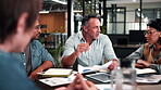 Office, meeting and businessman with paperwork, charts and investment management with data analysis. Business people, talk and financial forecasting with documents, graphs and collaboration with info
