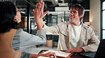High five, discussion and business people in office for good news on finance report with teamwork. Happy, collaboration and financial advisors with celebration for positive feedback on investment.