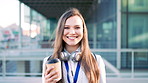 Face, woman and drink in city with realtor, headphones and commute for outdoor development. Happy, person or real estate agent with coffee for portrait, confidence or travel for property management