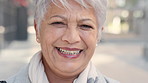 Face, smile and business woman in city, real estate agent and worker with career experience. Portrait, mature realtor and funny person with confidence, property development and opportunity in India