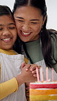 Candles, hug and mom with child with cake, dessert and sweet treats for celebration in home. Family, happy and mother with girl for birthday, bonding and applause for decoration, baking and embrace