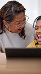 Tablet, grandmother and child laugh for elearning, educational game and headphones at home. Technology, grandparent and girl at family house for virtual class with help, funny joke and teaching