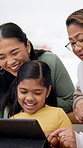 Tablet, happy family and help child with elearning for homework assistance, study support or laugh. Generations, asian people and kid with tech in home for online lesson, assignment help or education