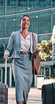 Conversation, city and business people with suitcase and walking for commute, travel and work trip. Corporate, team and woman with man in town for convention, meeting and talking for journey together