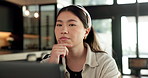 Student, thinking and Asian woman in home with laptop, problem solving and elearning for university. Person, reading and study in house with computer, online education and college research project.