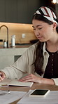 Remote work, writing and Asian woman with notebook in home, plot development and creativity for story. Planning, freelancer and author with narrative creation for novel, character notes and project