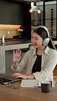 Woman, wave and video call in home with laptop for remote work, virtual conference and discussion. Freelancer, person and greeting with tech for online meeting, webinar communication and welcome