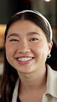 Face, laughing and woman with confidence in home for day off, relax and weekend break for wellness. Portrait, resting and Asian person with free time for stress relief, staycation and happy for joke