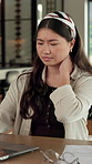 Neck pain, frustrated or Asian woman in home with laptop, burnout or joint paint with remote work. Tendinitis, bad posture or freelancer with technology, discomfort or fatigue in cervical sprain.
