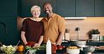 Face, cooking and interracial couple in home with support, love and meal prep with healthy food in kitchen. Mature, man and woman with portrait for recipe, help and culinary skills for nutrition