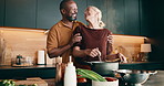 Cooking, happy and couple in kitchen at house with bonding, connection and love in marriage. Smile, hug and mature man with woman for preparing meal, dish or dinner together on weekend in home.