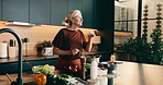 Cooking, taste and pot with mature woman in kitchen for food recipe, nutrition and healthy diet. Meal prep, dinner planning and retirement with senior person and home for flavor, dish or hunger