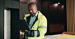 Design, laptop and renovation with black man in kitchen for home improvement or upgrade project. Computer, real estate and search with mature construction worker in apartment for property update