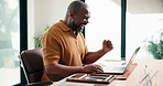 Black man, laptop and fist pump with success for remote work, editing article or creative in home. Project celebration, freelance writer and tech for approval with mature editor for story development