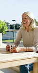 Senior, women and laugh on balcony with coffee, funny gossip and bonding together for weekend break. Happy, friends joke and old people outdoor at home with tea, conversation or humor for connection.