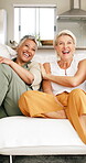 Bonding, laugh or friends in home with streaming, funny movie or happy moment in reunion. Smile, subscription or mature women with group hangout, comic show or connection in healthy relationship.
