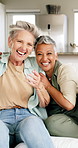 Celebration, happy and senior women on sofa for good news, winning or retirement plan. Excited, hug and elderly female friends with cheering for bonus, achievement or goal in living room at home.