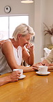 Mature, women and crying with friends for support, compassion and understanding for grief in home. Sad person, tears and mourning loved one in house with caring friendship, solidarity and empathy.