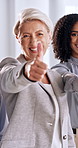 About us, face and thumbs up with business people in office together for support or thank you. Agreement, like and yes emoji with employee group in corporate workplace for congratulations or success