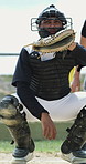 Baseball catcher, man and waiting in game on field for tournament, fitness and training outdoor. Exercise, athlete or person in team uniform, practice for competition or contest with skills or player