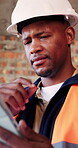 Architect, research and black man with tablet in building, thinking and safety inspection with info. Civil engineer, reflection and person with tech for property development, scroll and planning