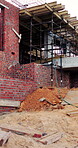 Construction, remodel or building with scaffolding, outdoor site or improvement of structure. Industrial, empty or demolition with project progress, refurbishment or maintenance of infrastructure.