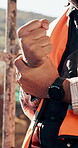 Construction, hands and man with wrist pain on site for physical strain, arthritis or work accident. Worker cramp, health and muscle fatigue outdoor from manual labor, tender joint or injury on duty