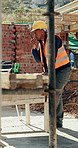 Construction site, black man and radio with inspection outdoor, renovation checklist and communication. Civil engineer, inspector and contact for update, building progress and property development