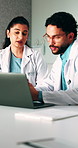 Medical, discussion or team in hospital with laptop, research or patient review for treatment plan. Healthcare, people or doctors with tech, collaboration insight or partner feedback in post surgery.