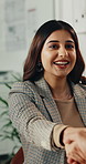 Handshake, meeting and business woman for partnership, merger or thank you in office. B2B deal, team and shaking hands for welcome, congratulations or client introduction for collaboration agreement