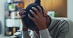 Black woman, stress and panic in home for mistake, fear or loss with pressure or phobia. Trauma, overthinking or female person with depression in living room with anxiety for mental health crisis