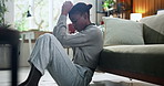 Black woman, stress and overthinking in home for mistake, fear or loss with pressure or phobia. Trauma, panic or female person with depression in living room with anxiety for mental health crisis