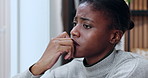 Black woman, biting nails and overthinking in home for anxiety, mistake or fear with phobia. Trauma, panic or female person with depression in living room with stress for mental health pressure