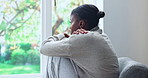 Black woman, window and overthinking in home for anxiety, mistake or fear with pressure or phobia. Trauma, panic or female person with depression in living room with stress for mental health crisis