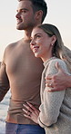Couple, walk and holiday by beach with conversation, bonding together and affection on weekend trip. Happy, married people and journey outdoor by ocean with vacation, relationship and commitment.
