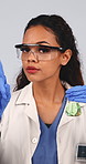 Face, scientist and chemistry in studio with warning, safety lesson and danger of experiment. Portrait, woman and goggles with gesture, no drinking and caution for toxic chemicals on white background