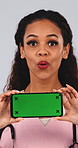 Nurse, face and happy woman with phone, green screen and healthcare website recommendation in studio. White background, medical professional or person with mobile, online and wellness presentation