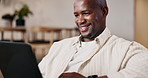 Laptop, remote work and smile with black man on sofa in living room for small business in home. Digital tech, planning and report with freelancer in apartment for startup research, proposal or review