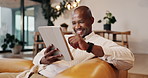 Relax, sofa or black man with tablet in home for entertainment, online subscription or network. Male person, chill or smile with technology on living room couch for comfort or app connection in house