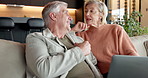 Couple, talking and tablet in home at smile, love and browsing website for bonding together. Happy, mature people and laughing at house with pc, discussion and funny joke for weekend break in lounge