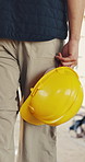 Hands, helmet and man at construction site for walking, inspection and evaluation for building. Architecture, supervisor and back of person with ppe for engineering, safety compliance and planning