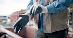Architecture, builder and hands with gloves, construction and protection for manual labor or outdoor. Building site, safety and person with ppe for property development, civil engineering and project