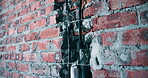 Plumbing, installation and renovation on construction site, brick wall and home improvement project. Building, repairs and house upgrade for property development, engineering or real estate structure