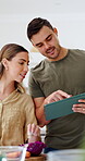 Cooking, research and couple with tablet in kitchen, online or learn culinary skills on social media. Meal prep, home and happy people with tech, scroll and recipe tips on website and discussion