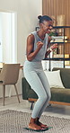 Fitness, weight scale or black woman in house with celebration, monitoring or success in progress track. Happy, wellness or person with machine, transformation target or achievement in body goals.