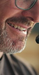 Telecom, man and mouth with laugh for customer service, funny story or headset for technical support. Agent, happy person and speaking with contact for help desk, advice or joke for CRM consultation.