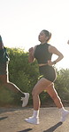 Fitness, friends and running on mountain road with nature, training together or journey for wellness. Active, people and outdoor with cardio exercise, endurance challenge or runner check smart watch.