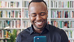 Teacher, man and phone in school library with college education, laugh and text message for funny joke. Happy, black person or educator scroll on campus with tech, humor or mobile app for university.