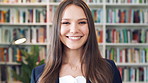 Happy, face and woman with pride in library, knowledge or creative for publishing career development. Literary agent, laugh and person with talent representation job, confident and opportunity in USA